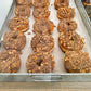 A whole tray of our irresistible Peanut Choco Crunch ball doughnuts